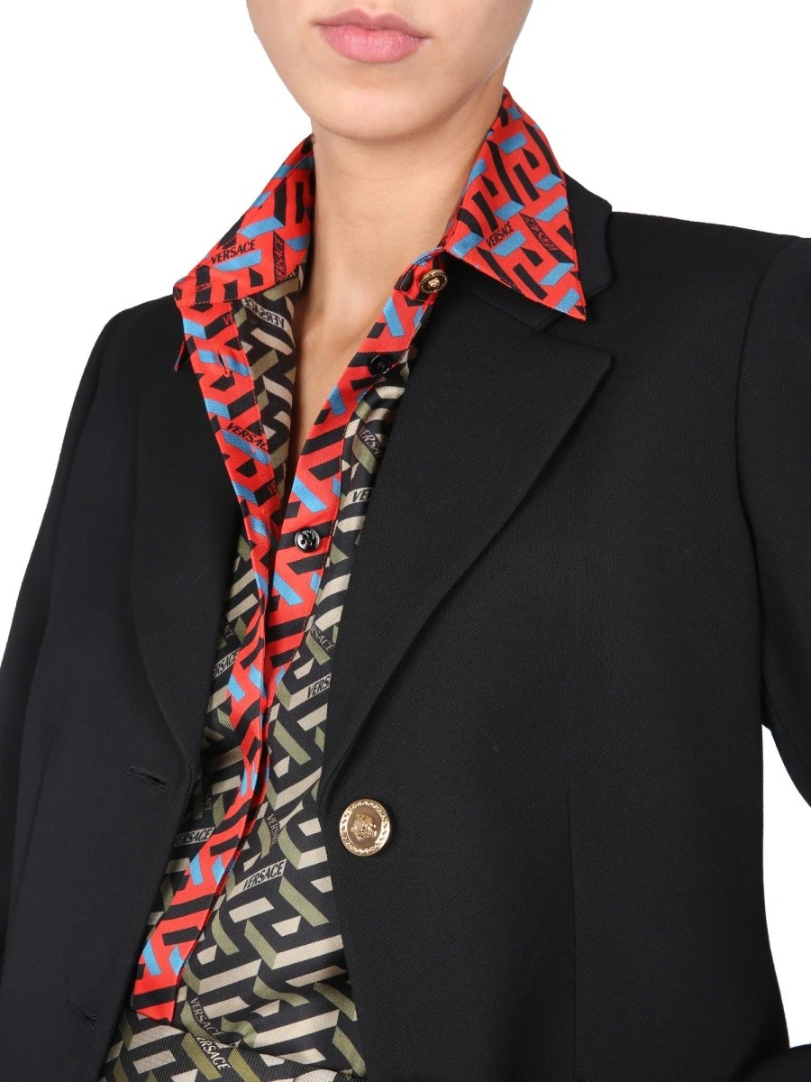JACKET WITH MEDUSA BUTTON.webp