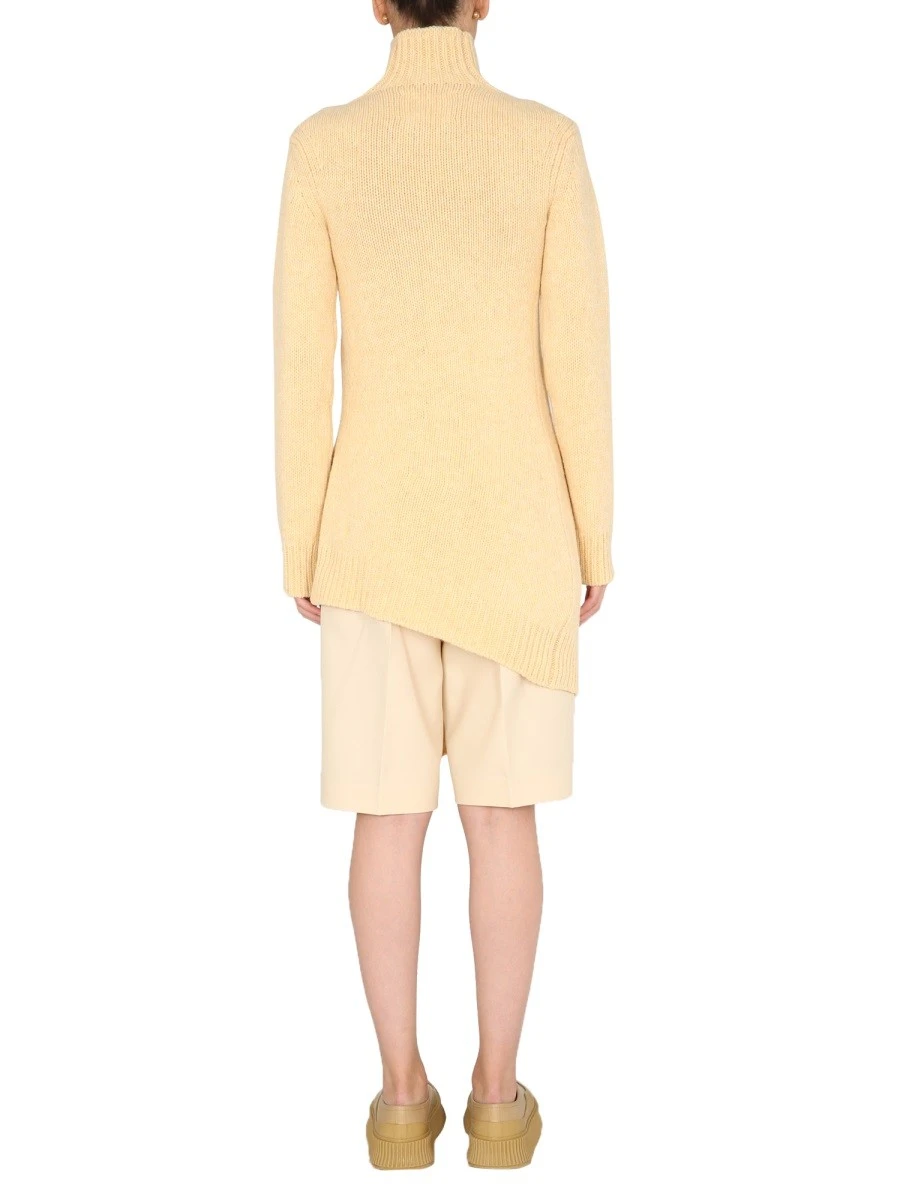 LONG ASYMMETRIC SWEATER.webp