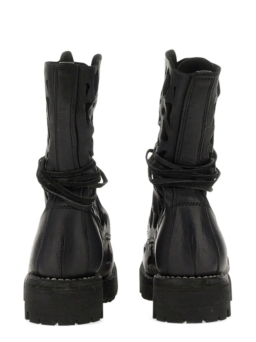ANKLE BOOT WITH CUT OUT DETAILS.webp