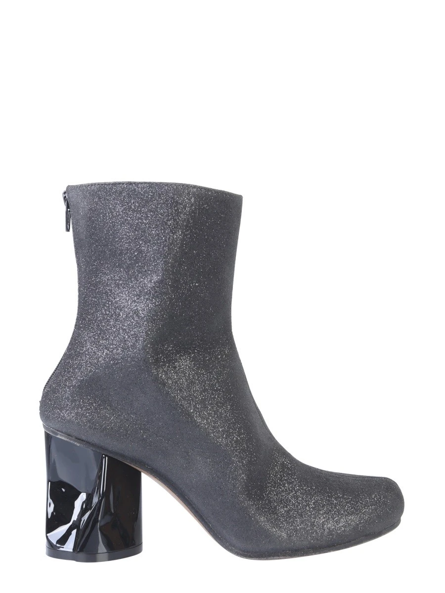 BOOT WITH CRUSHED HEEL.webp