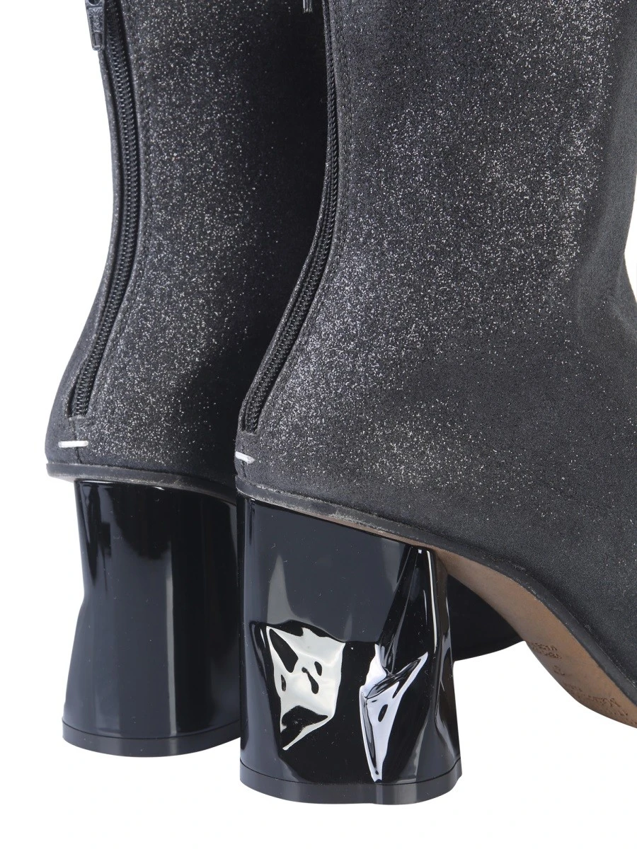 BOOT WITH CRUSHED HEEL.webp