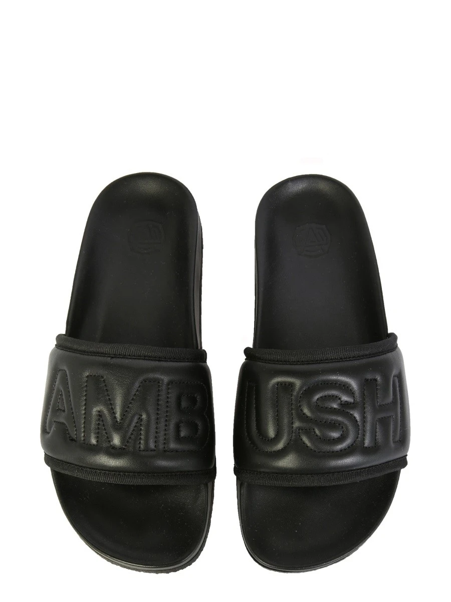 LEATHER SLIDE SANDALS.webp