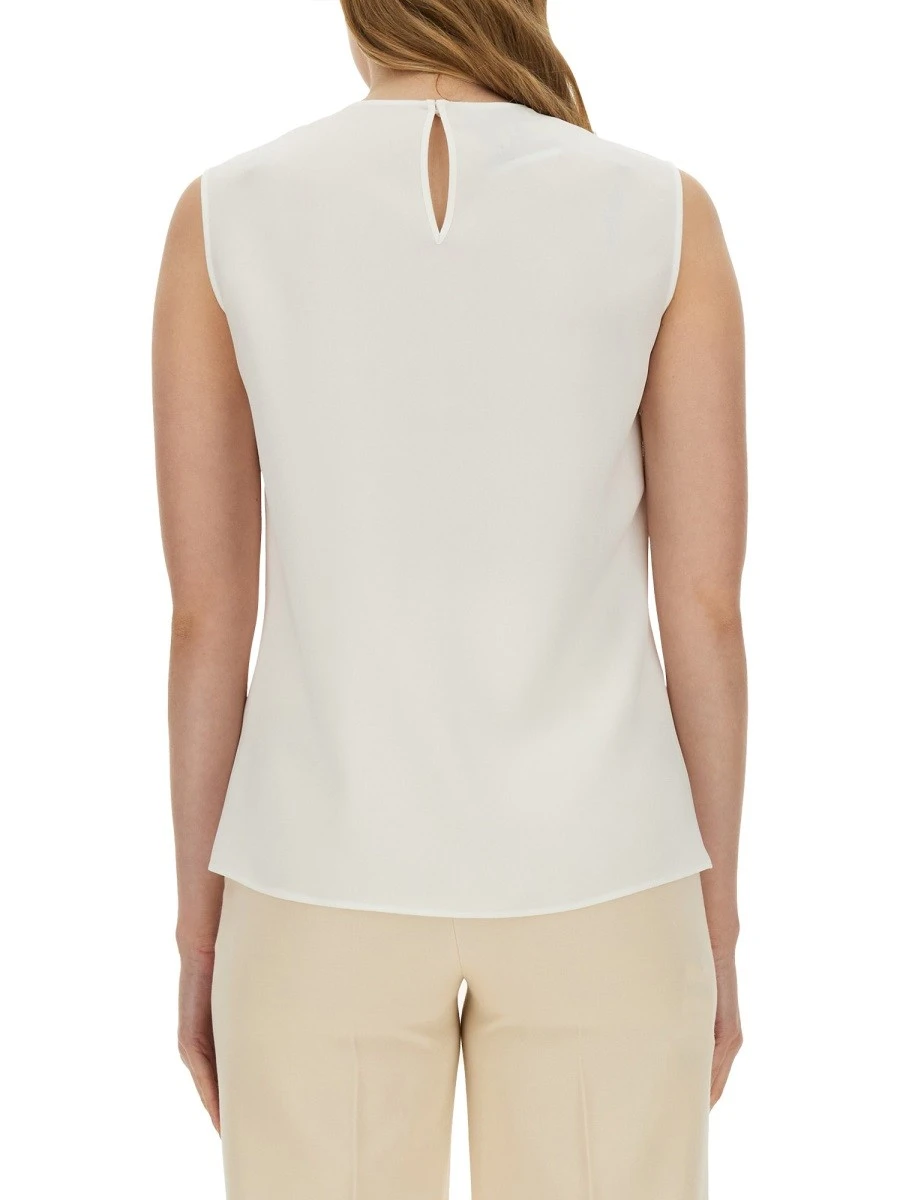 BLOUSE WITH HEART APPLIQUE.webp