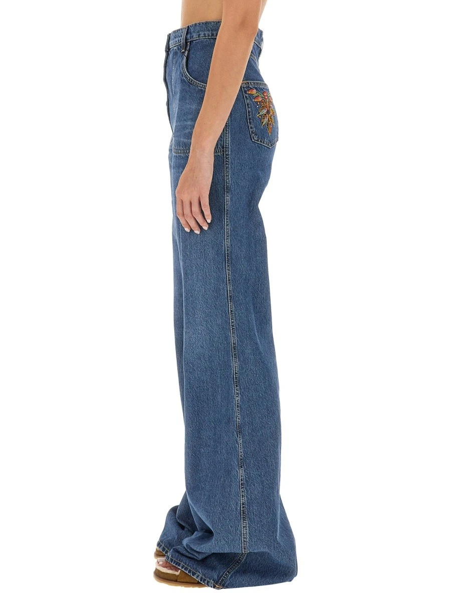 JEANS WITH FOLIAGE POCKETS.webp