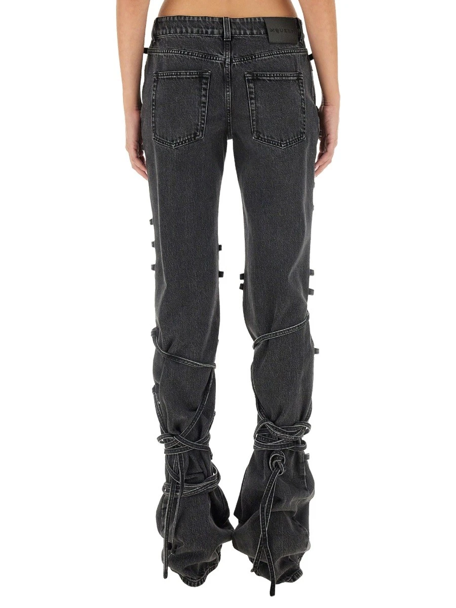 JEANS WITH KNOTTED DETAIL.webp