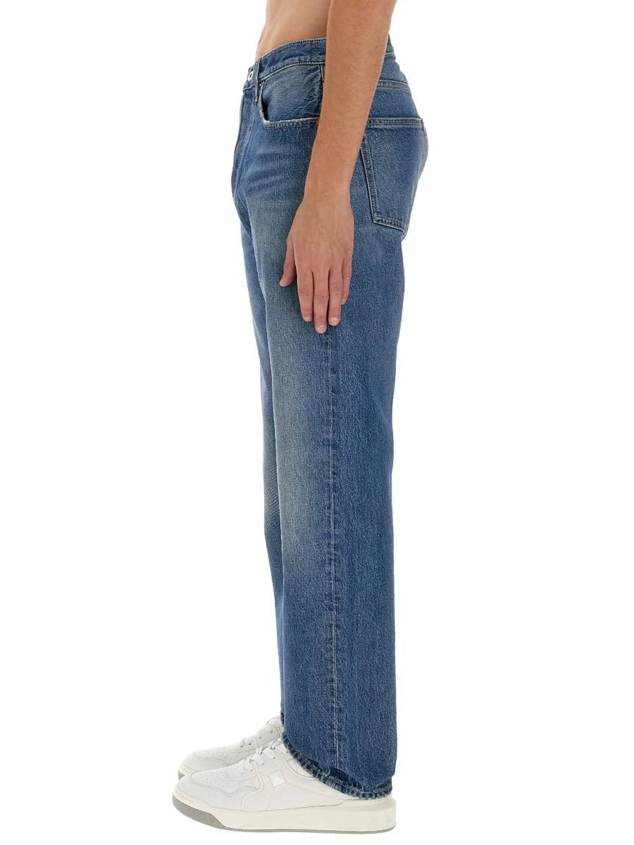 JEANS WITH LOGO DETAIL.webp