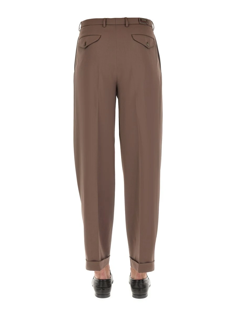 PANTS WITH GUCCI LABEL.webp