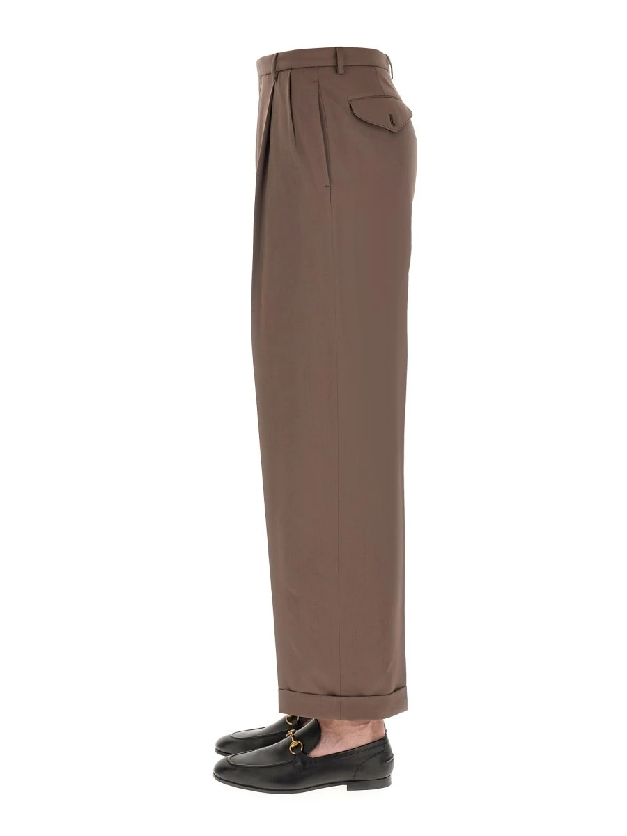 PANTS WITH GUCCI LABEL.webp