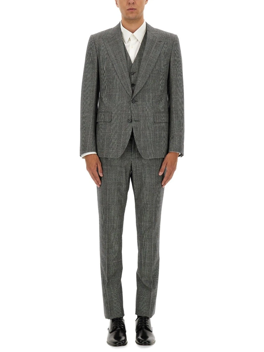 THREE-PIECE SUIT.webp