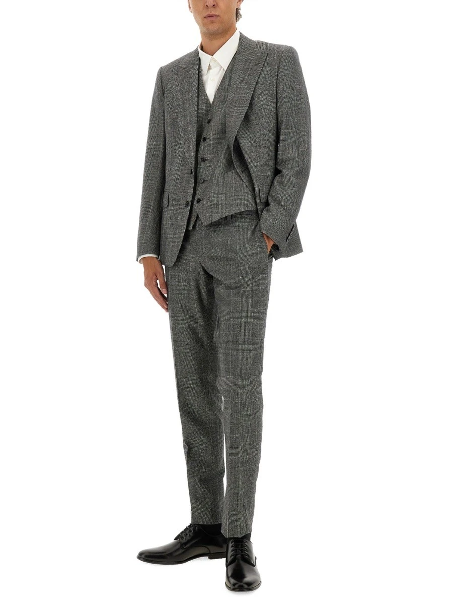 THREE-PIECE SUIT.webp