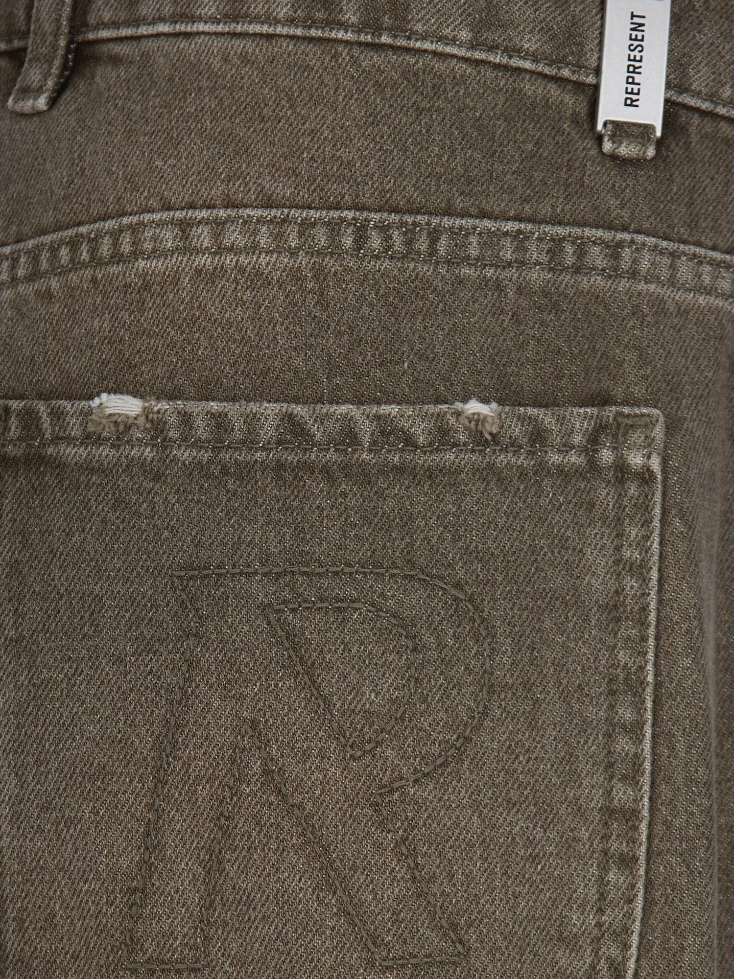 Jeans with rewashed effect.webp