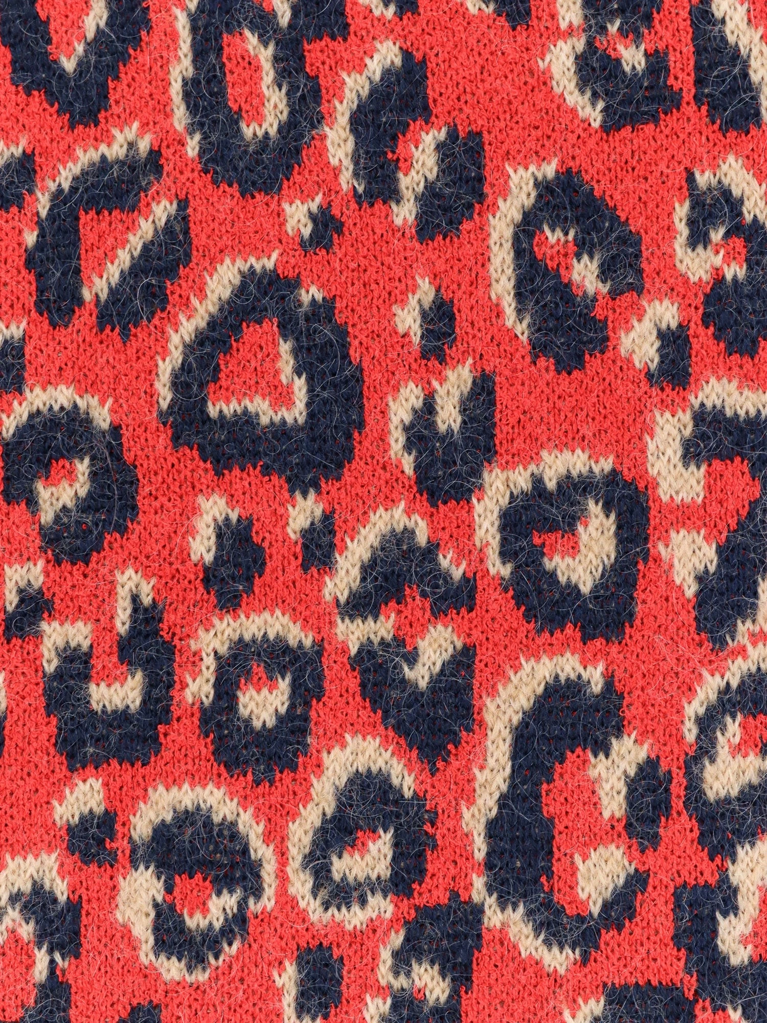 Wool blend sweater with animal print.webp