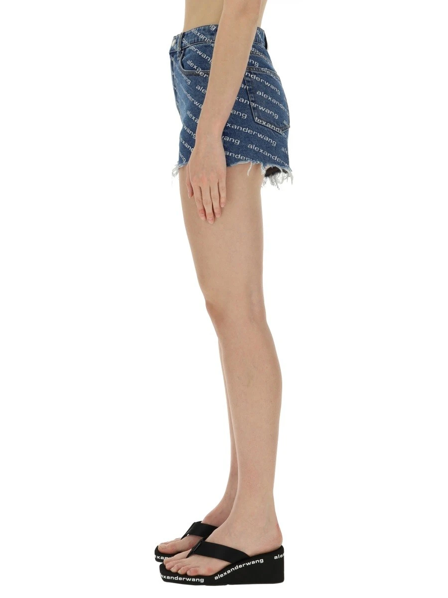 SHORTS WITH ALL OVER LOGO.webp