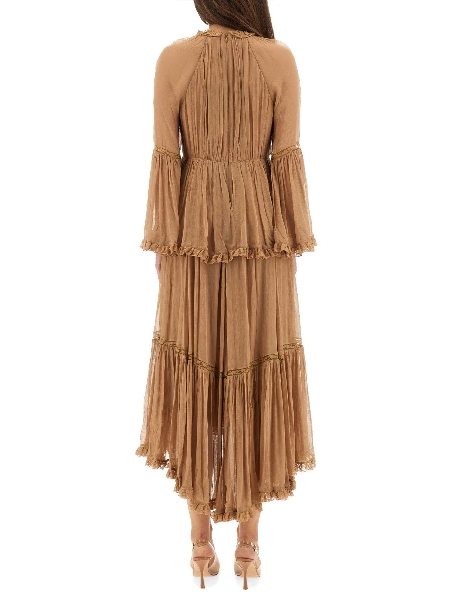 "HYPNOTIC PEPLUM" RUFFLE DRESS.webp