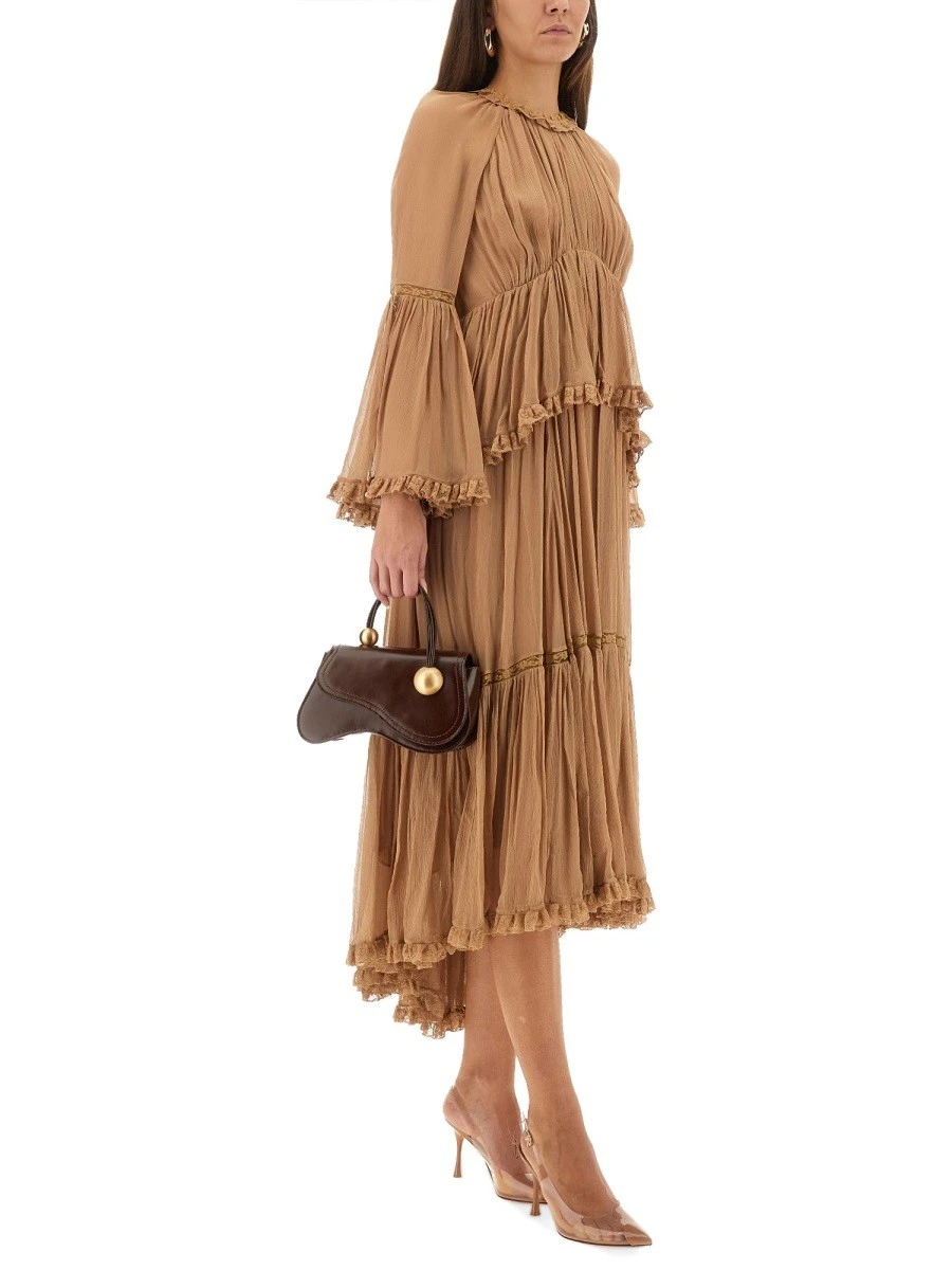 "HYPNOTIC PEPLUM" RUFFLE DRESS.webp