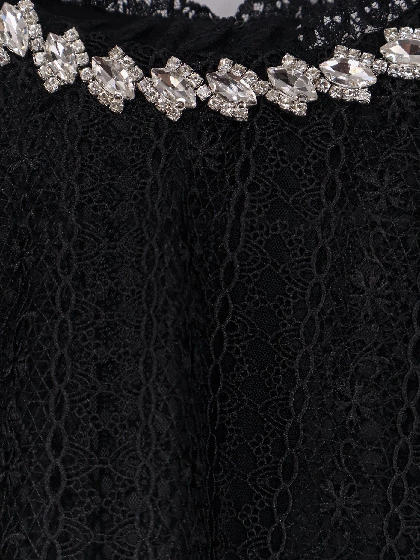 Lace top with rhinestones.webp
