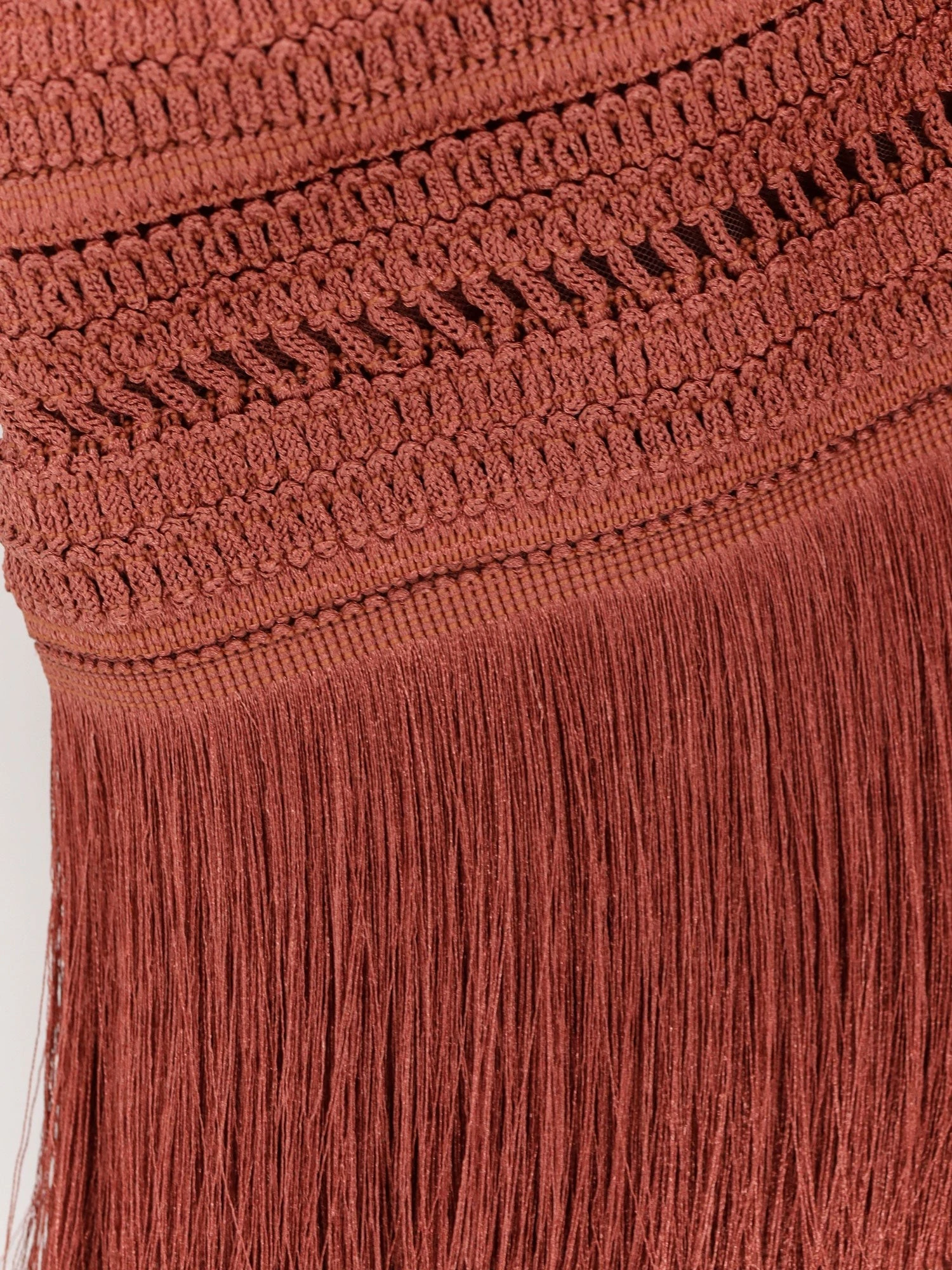 Asymmetrical top with fringes.webp