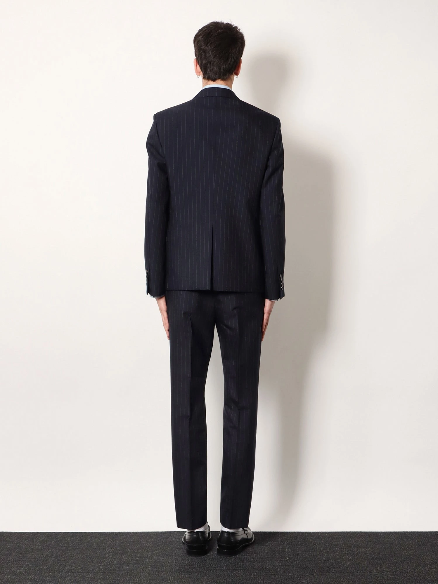 Gucci pinstripe wool trousers.webp