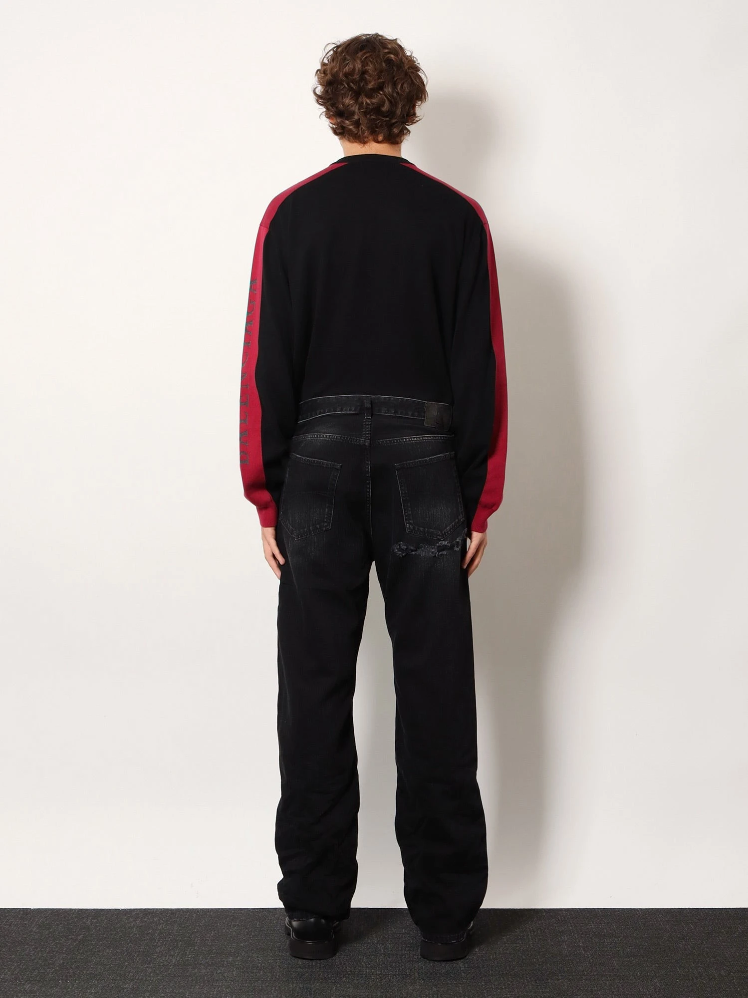 Black denim jeans.webp