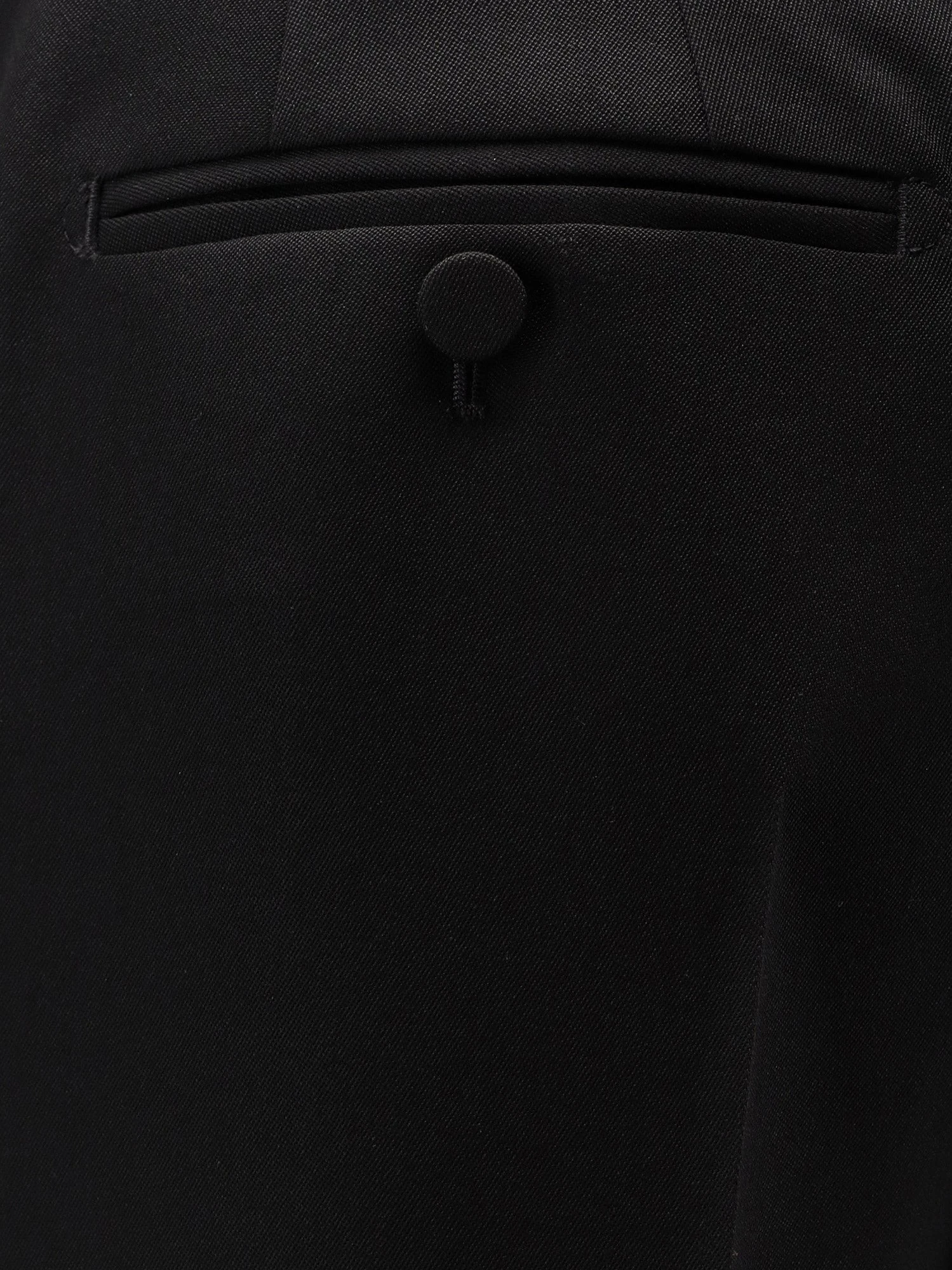 Pleated wool trousers.webp