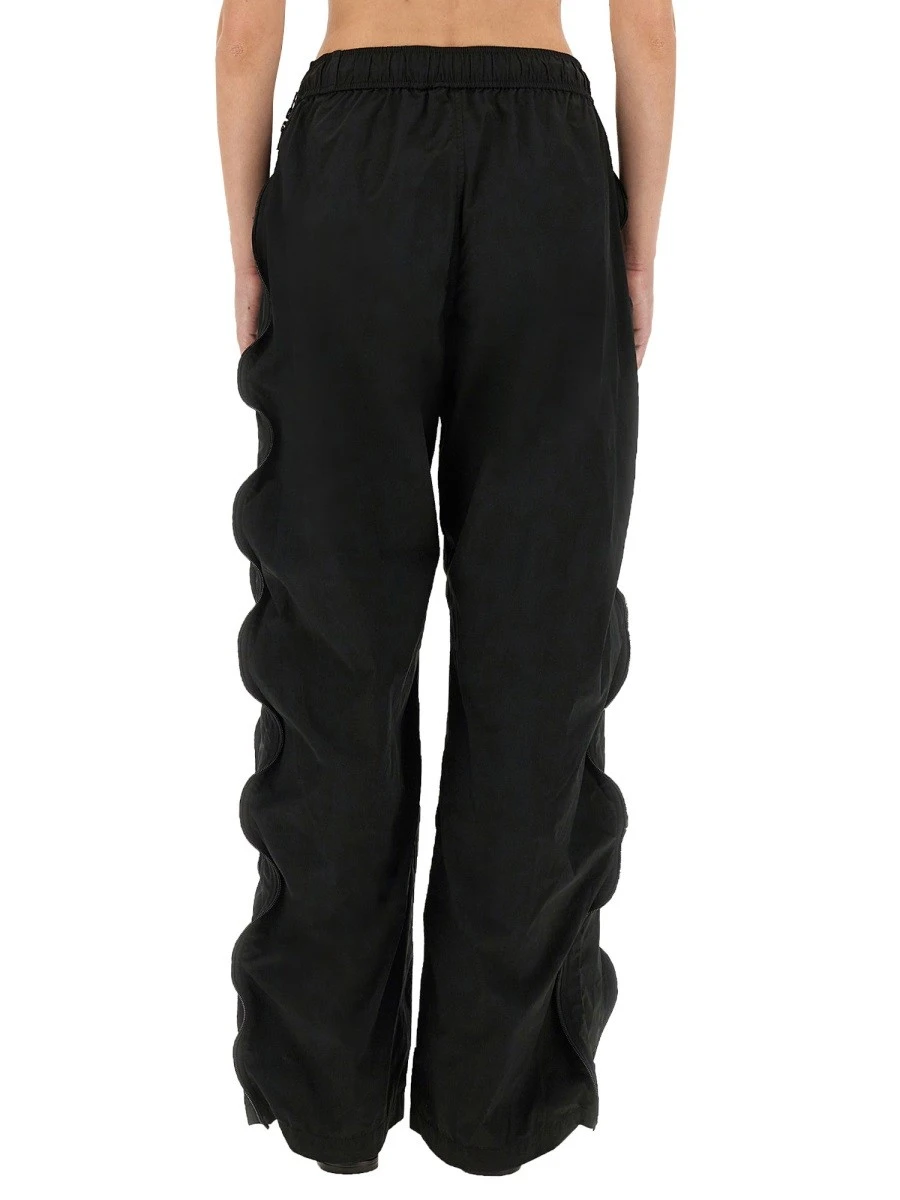 MID-RISE TRACK PANTS WITH ZIPPER.webp