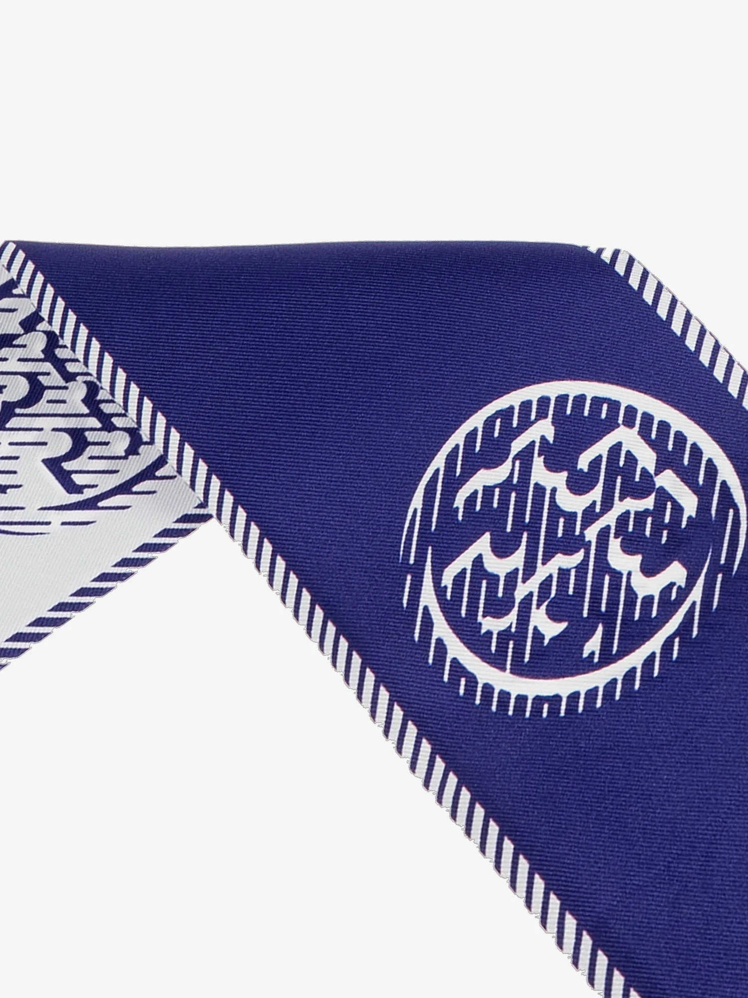Medallion Logo Ribbon silk tie.webp