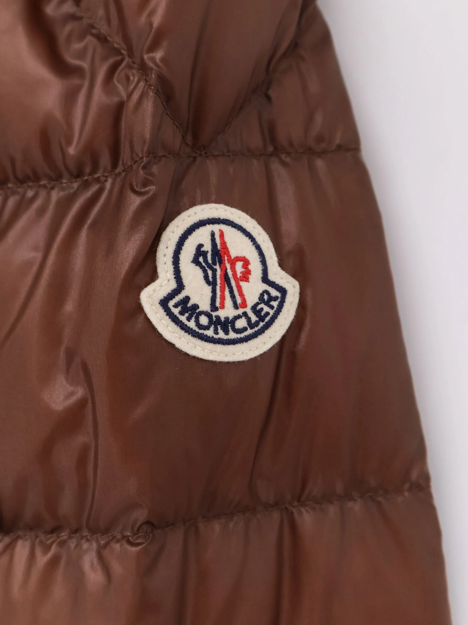 Selves down jacket with iconic patch.webp