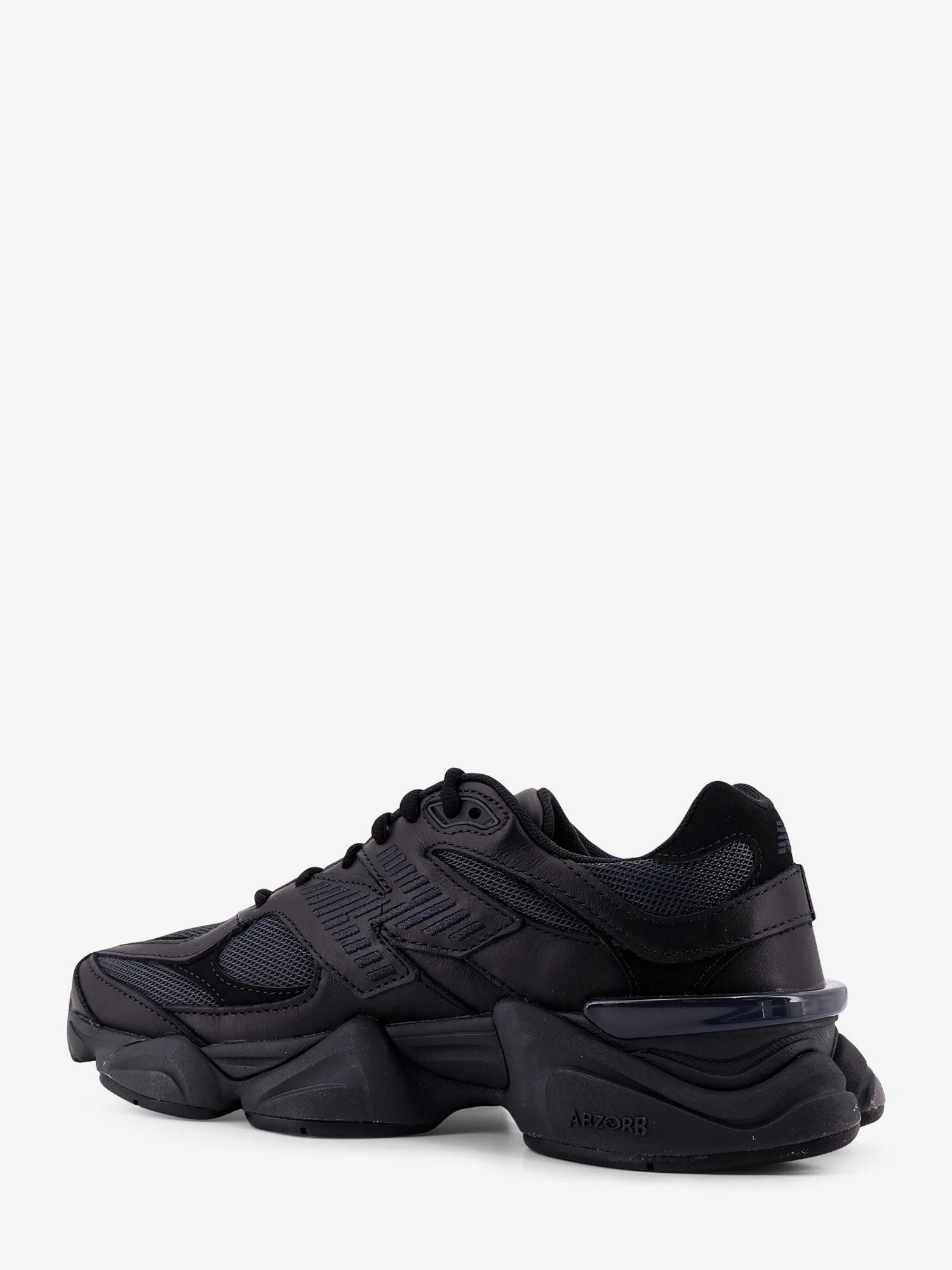 9060 mesh sneakers with logo on the side.webp