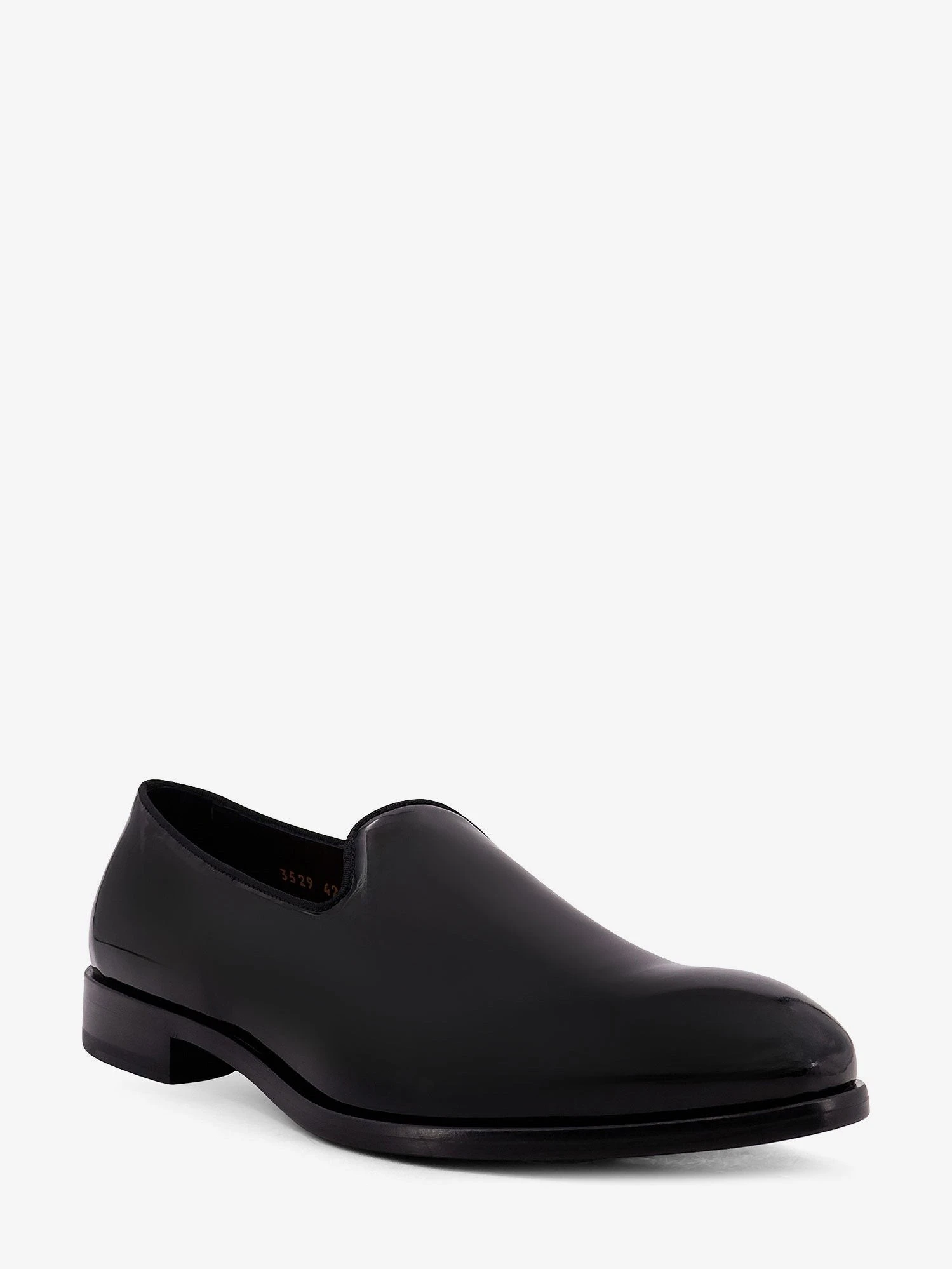 Patent leather loafers.webp