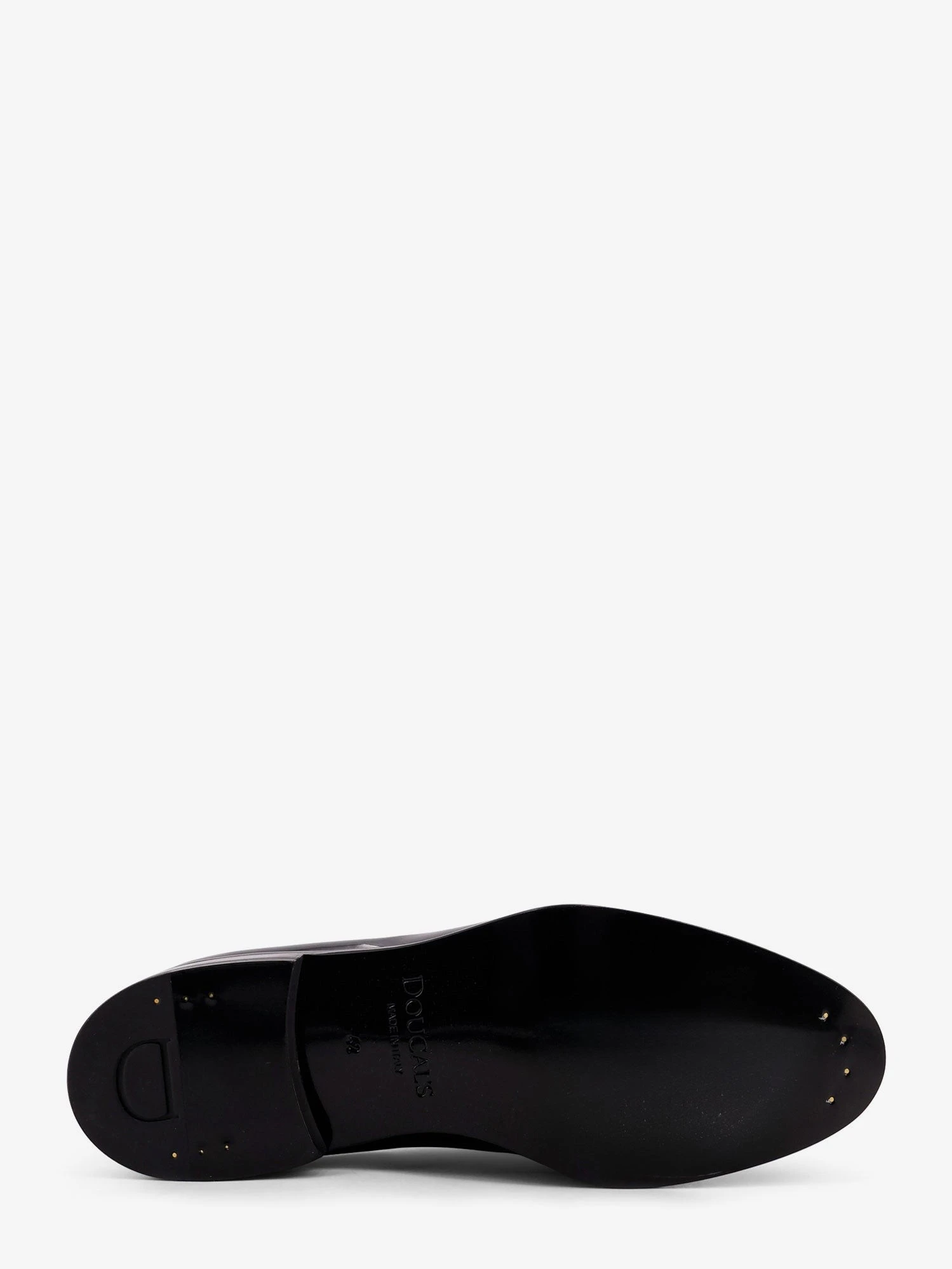 Patent leather loafers.webp