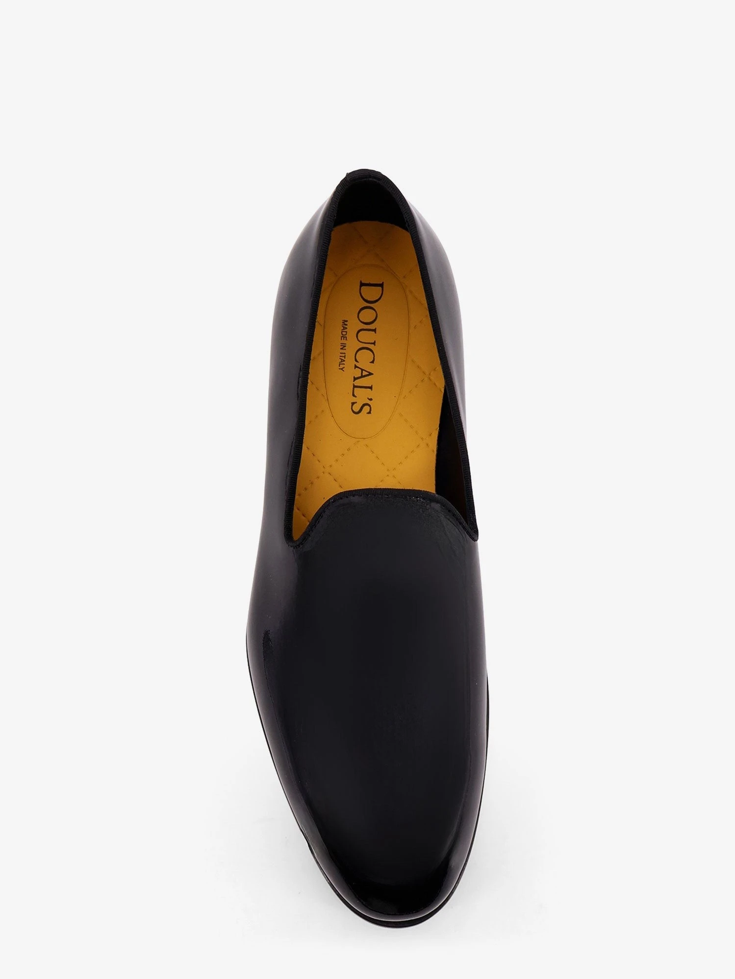 Patent leather loafers.webp