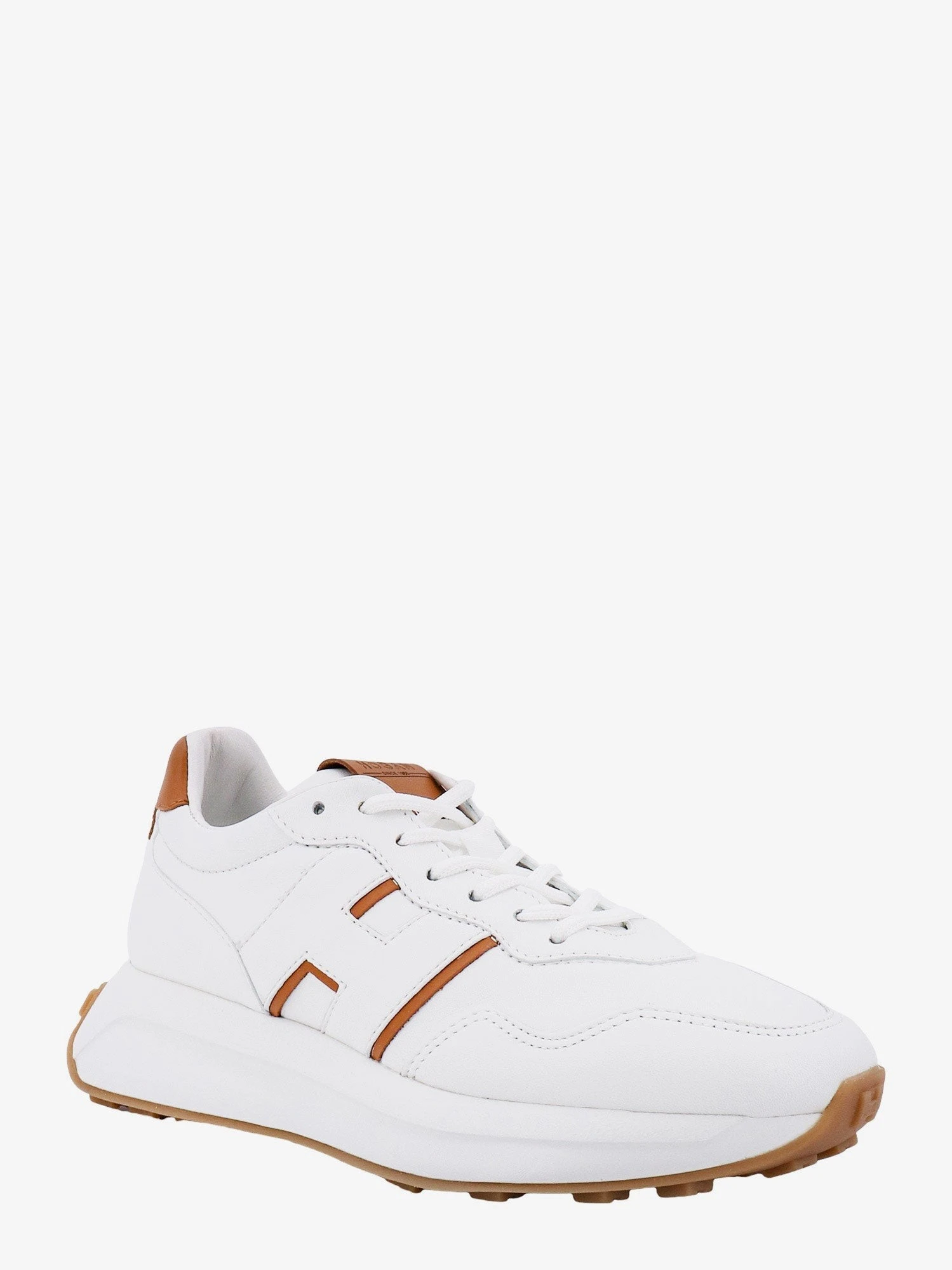 Leather sneakers with logo on the side.webp