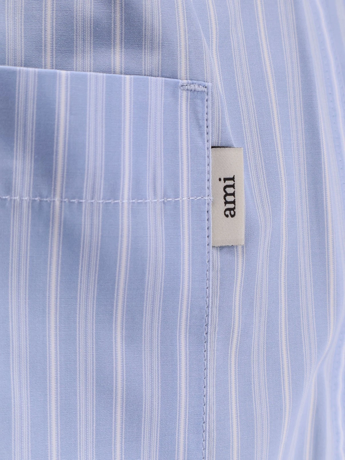 Cotton bermuda shorts with striped pattern.webp