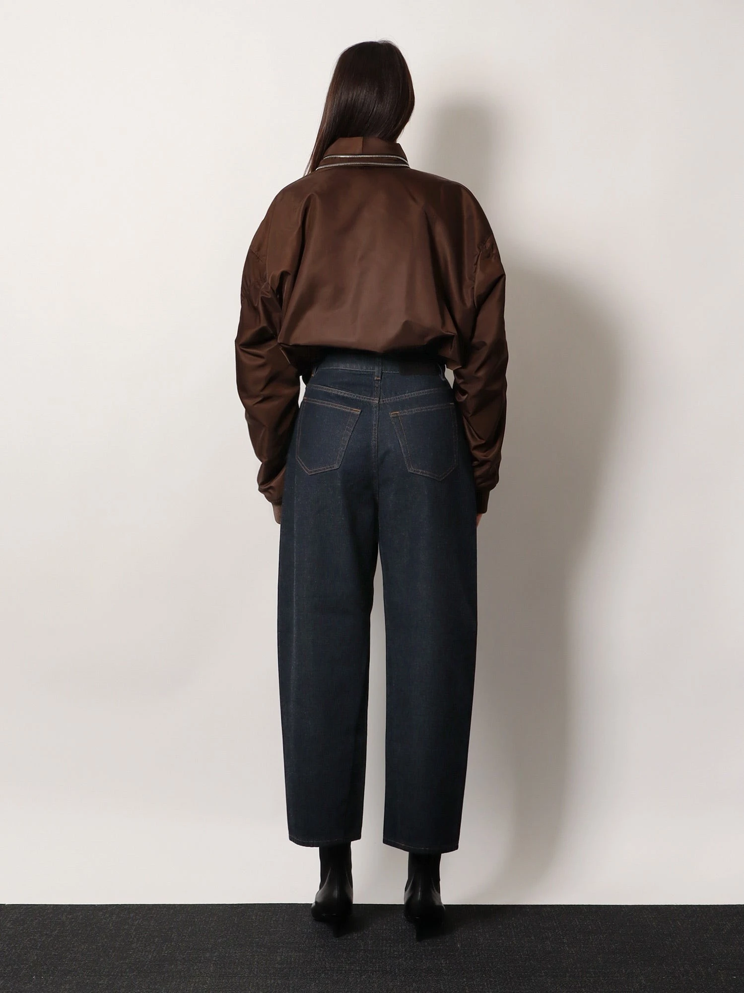 Twisted dark blue denim jeans.webp