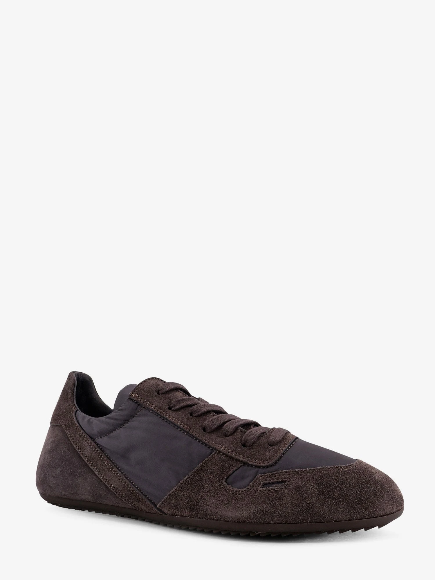 Minimal nylon and suede sneakers.webp