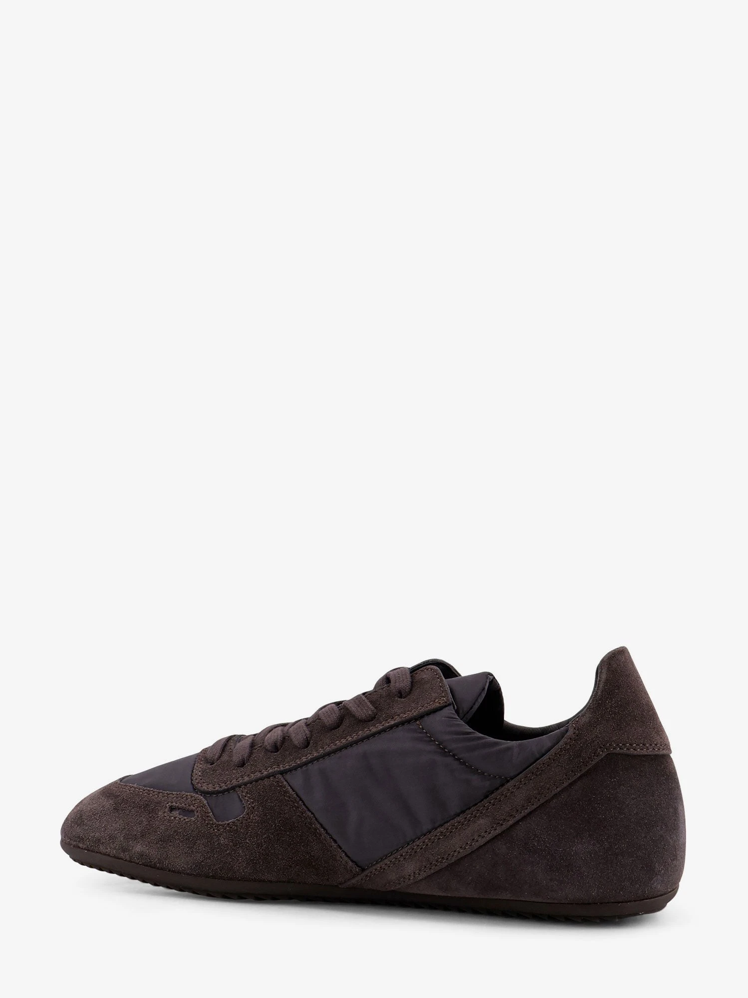 Minimal nylon and suede sneakers.webp