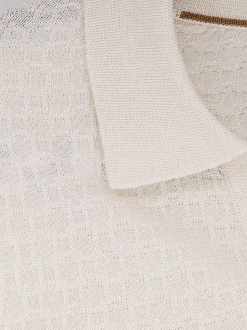 Silk sweater with processing all-over.webp