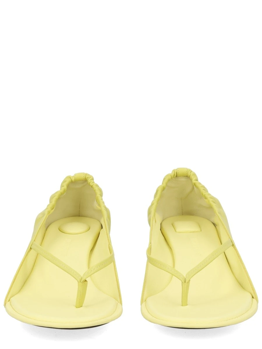 SANDALO CON TACCO.webp