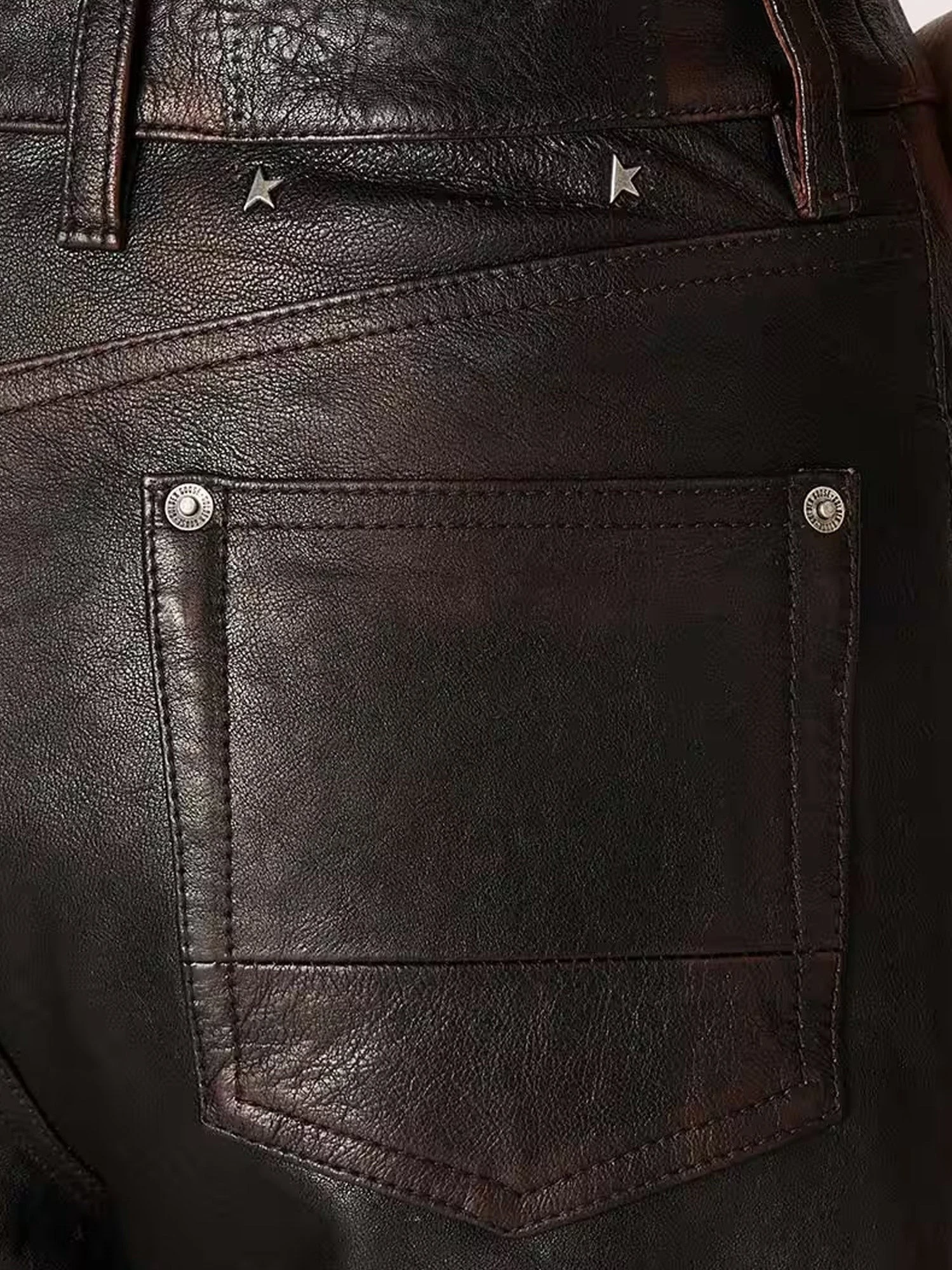 Peg leather trousers.webp