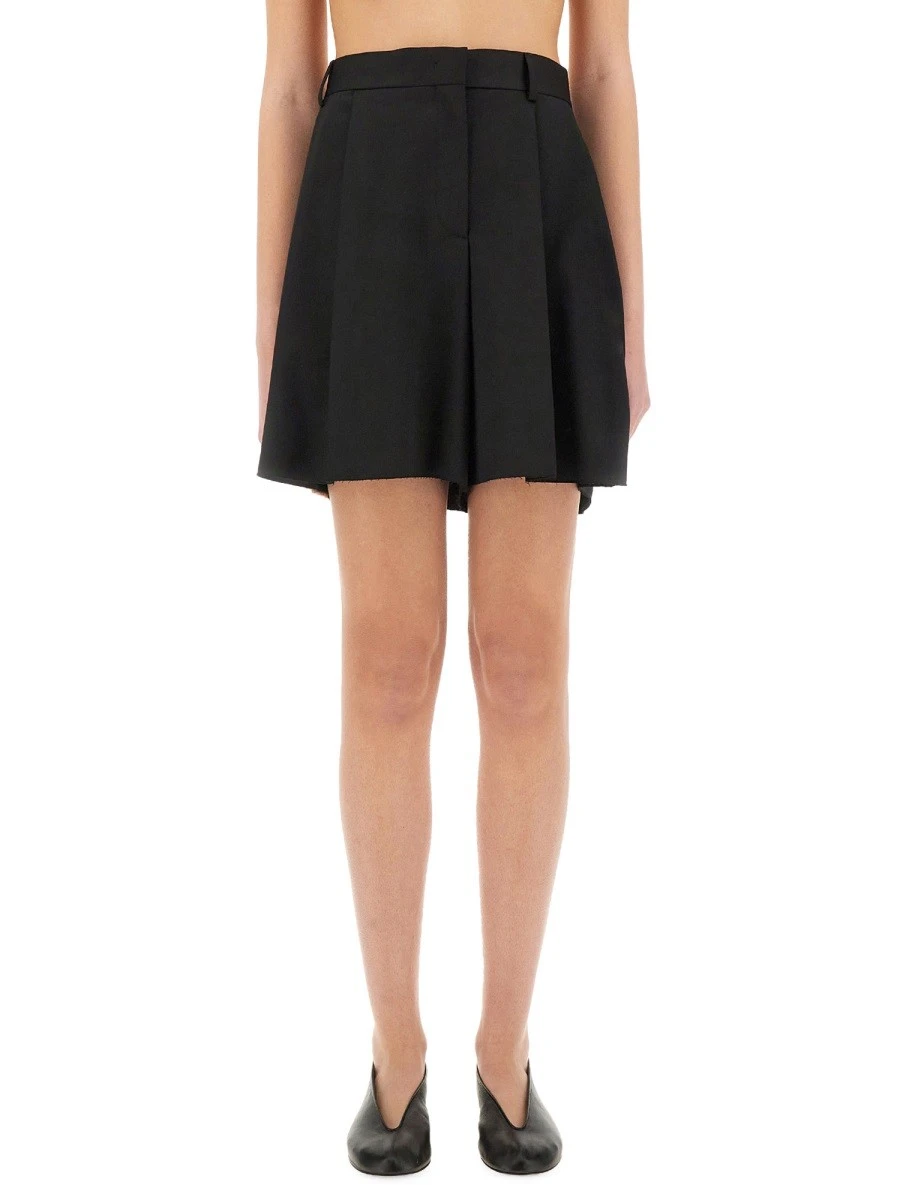 ASYMMETRICAL WOOL SHORTS.webp