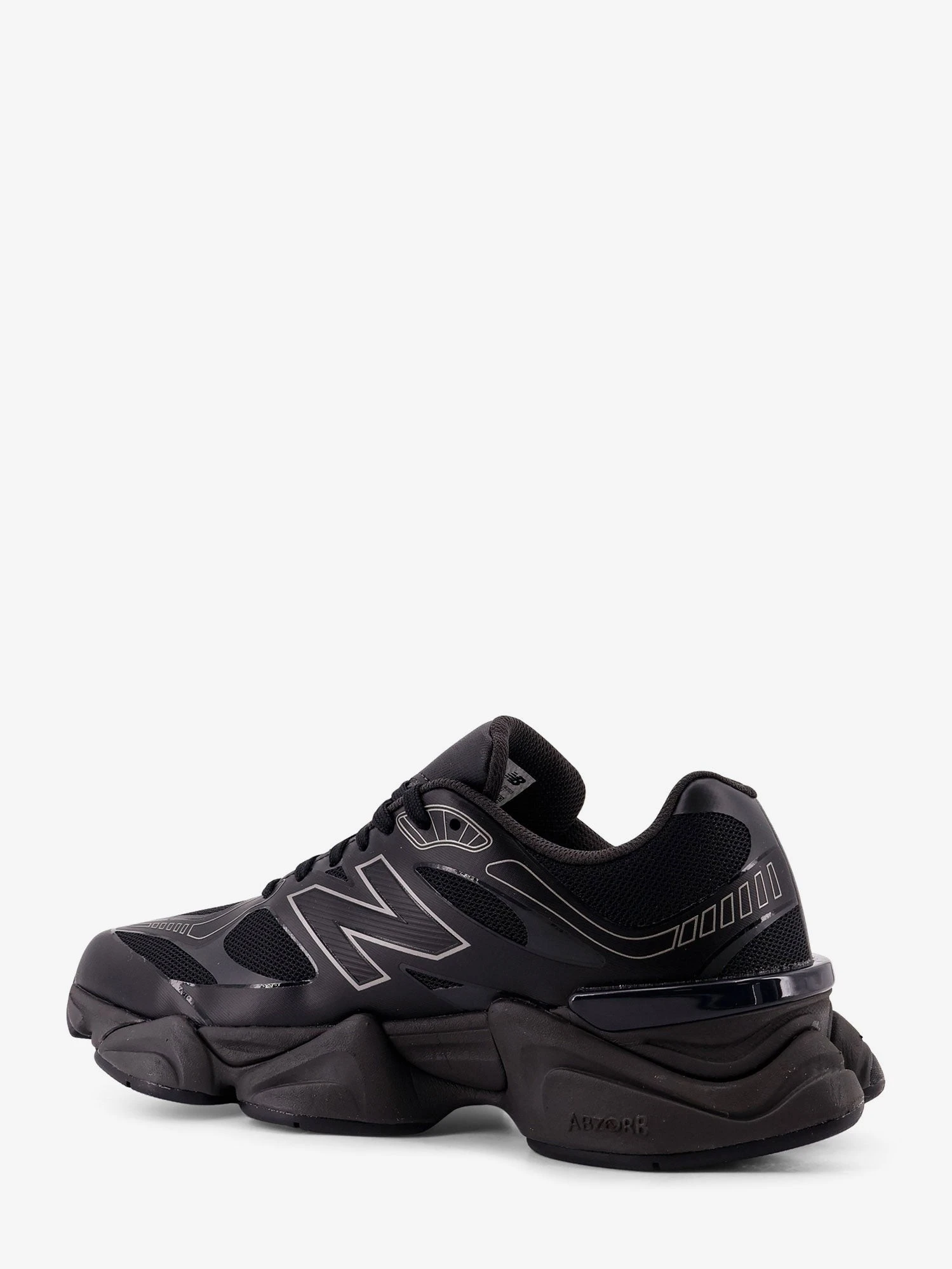 740 mesh sneakers with logo on the side.webp