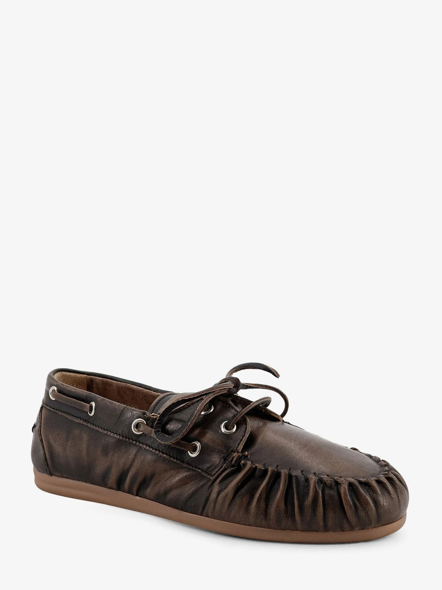 Used-effect leather loafers.webp