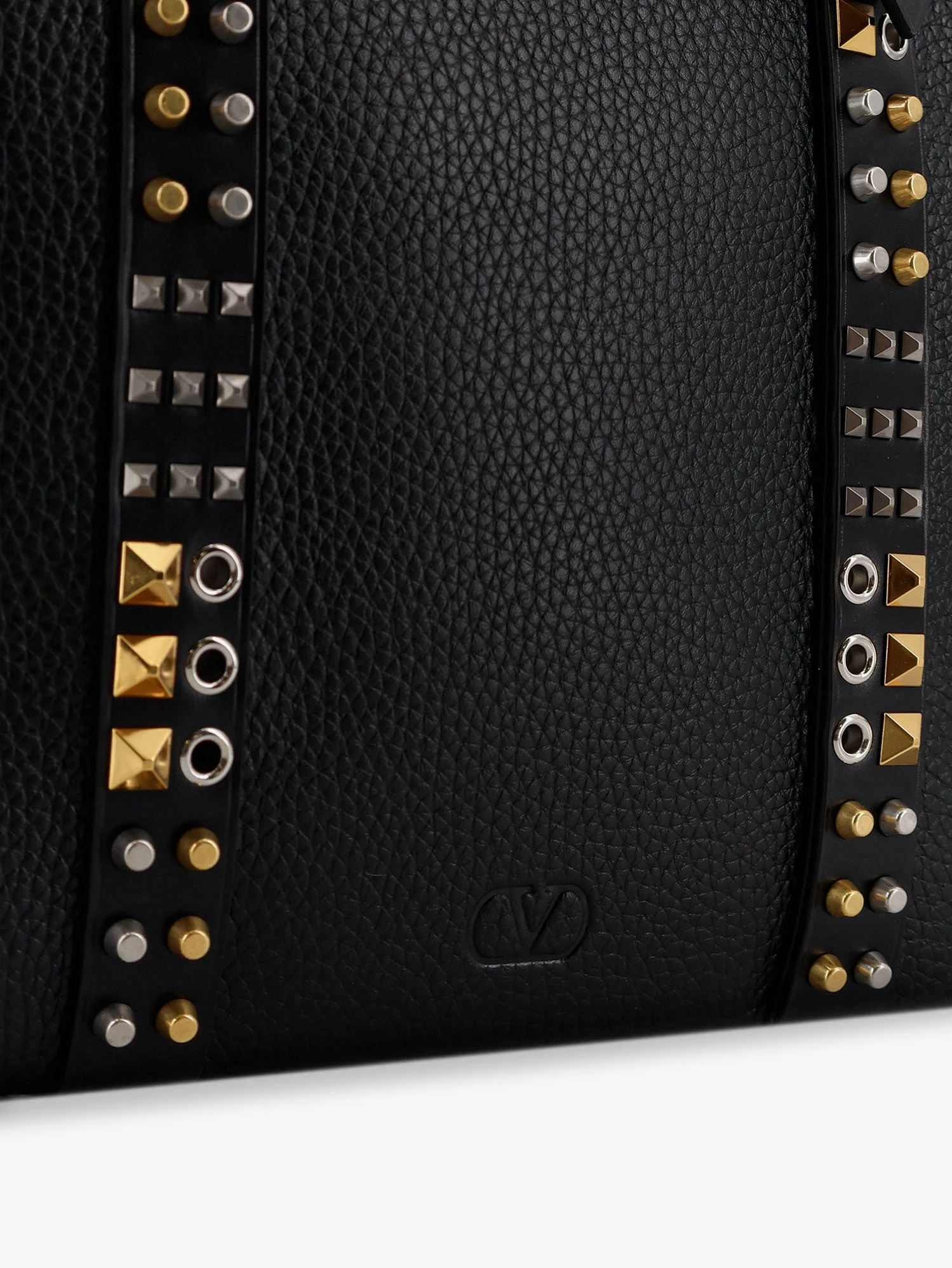 Leather shoulder bag with iconic studs.webp