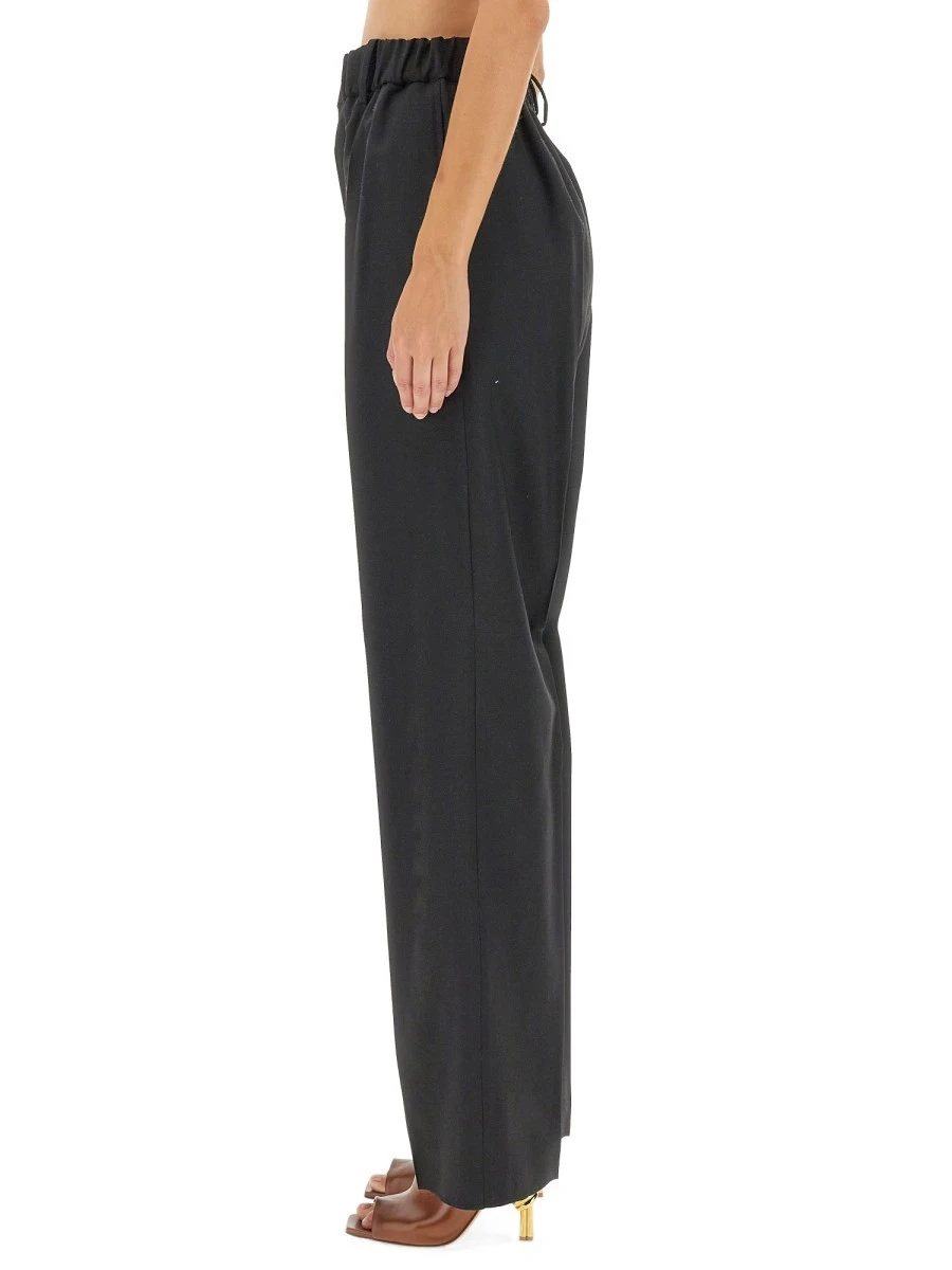 Leather sneakers with stitching detail.webp