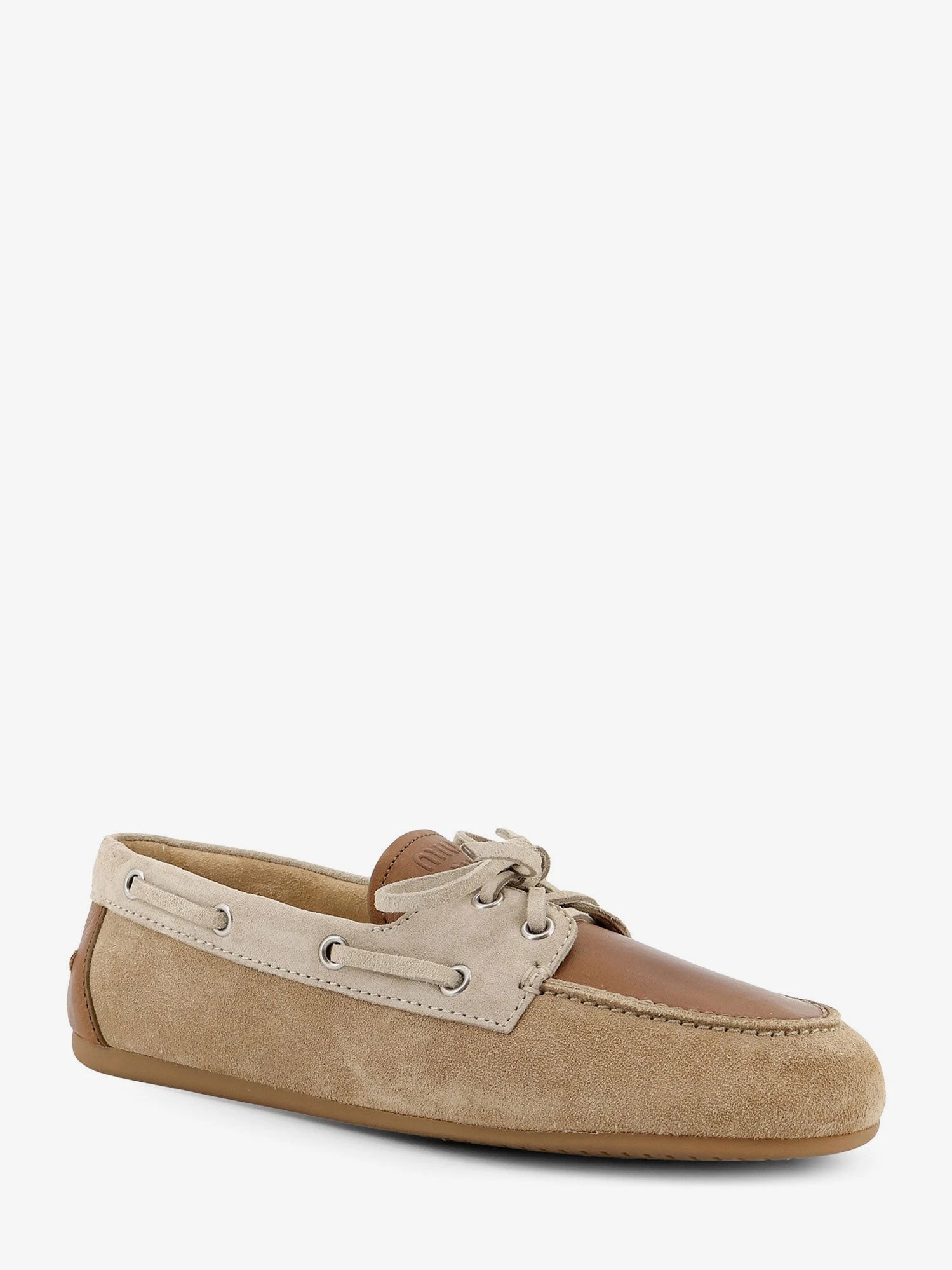 Suede loafer with leather inserts.webp