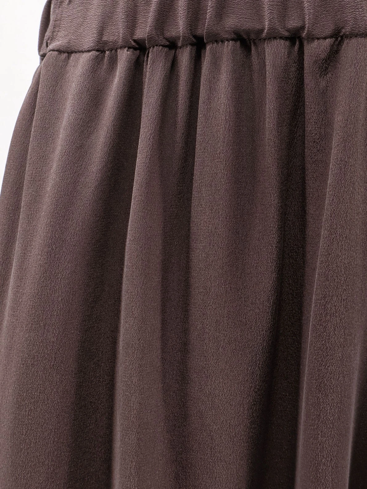 Baloon silk trousers.webp