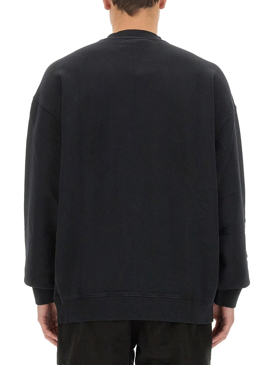 OPTICAL CROSS SWEATSHIRT.webp