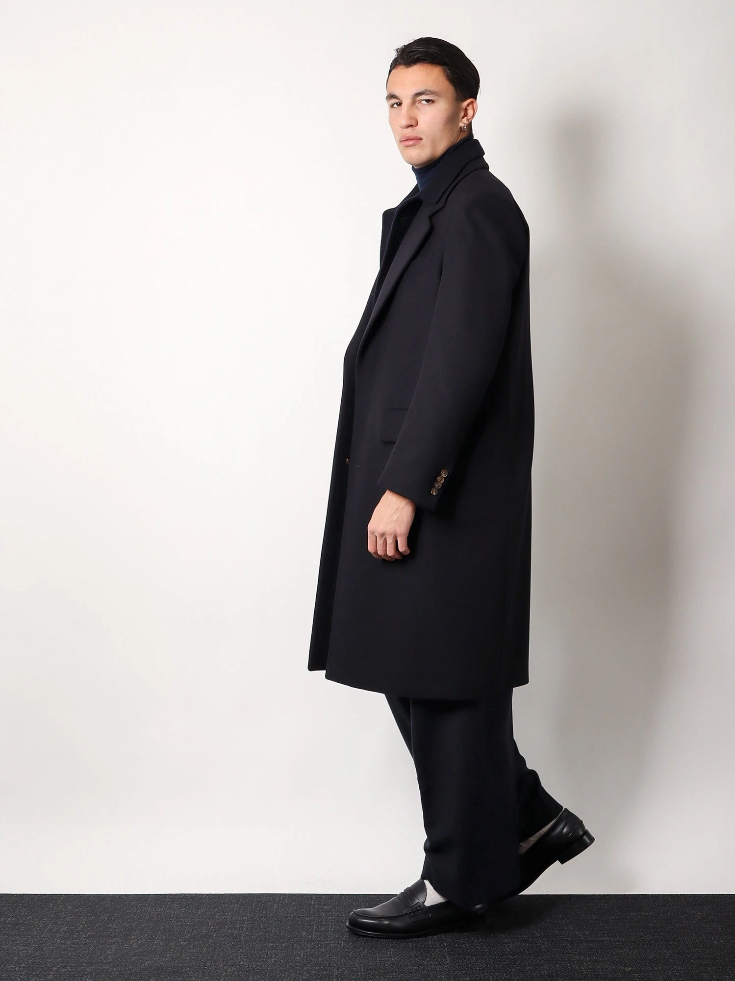 Virgin wool coat with satin lining.webp