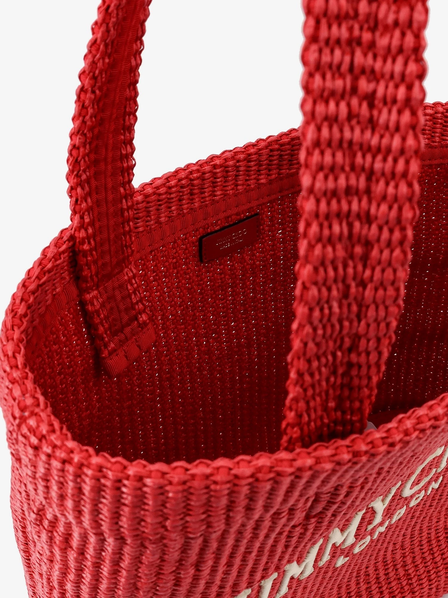 Raffia shopping bag with lettering logo on the front.webp