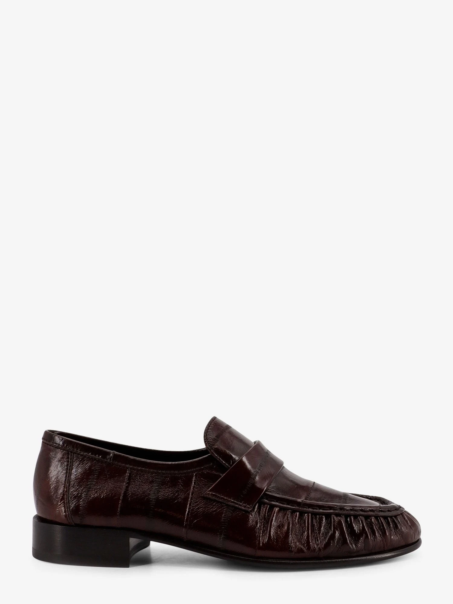 Shiny leather loafers.webp